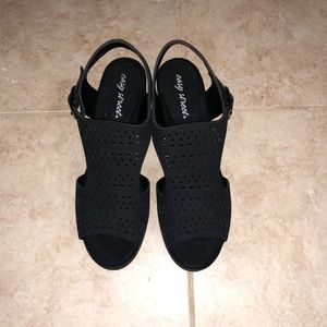 New never worn black woman’s sandals